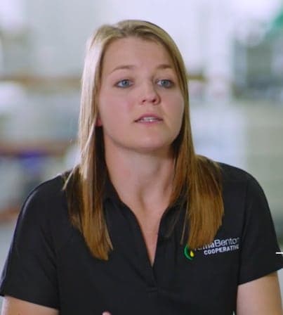 father and son in a corn field